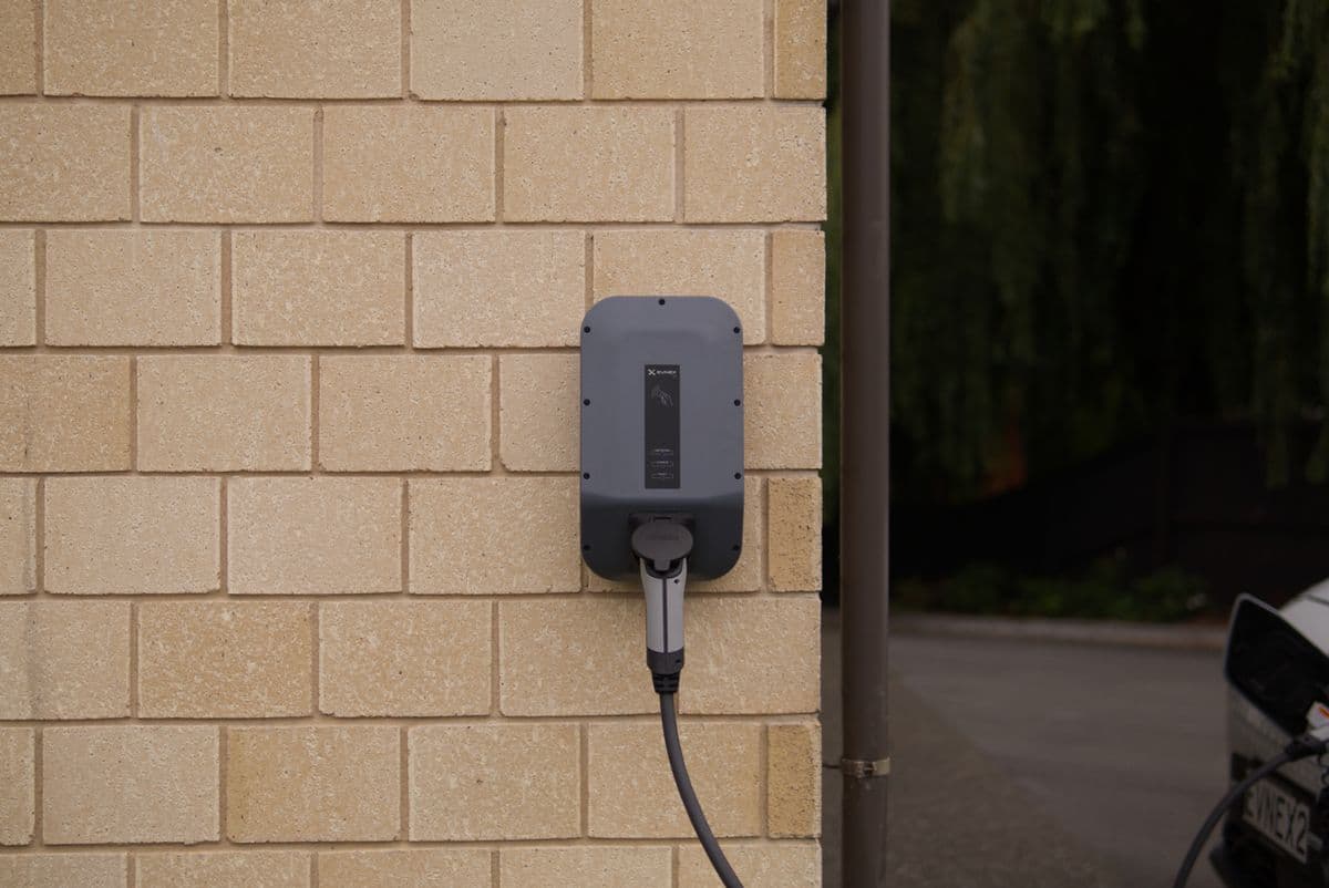 Wall-mounted electric vehicle charger