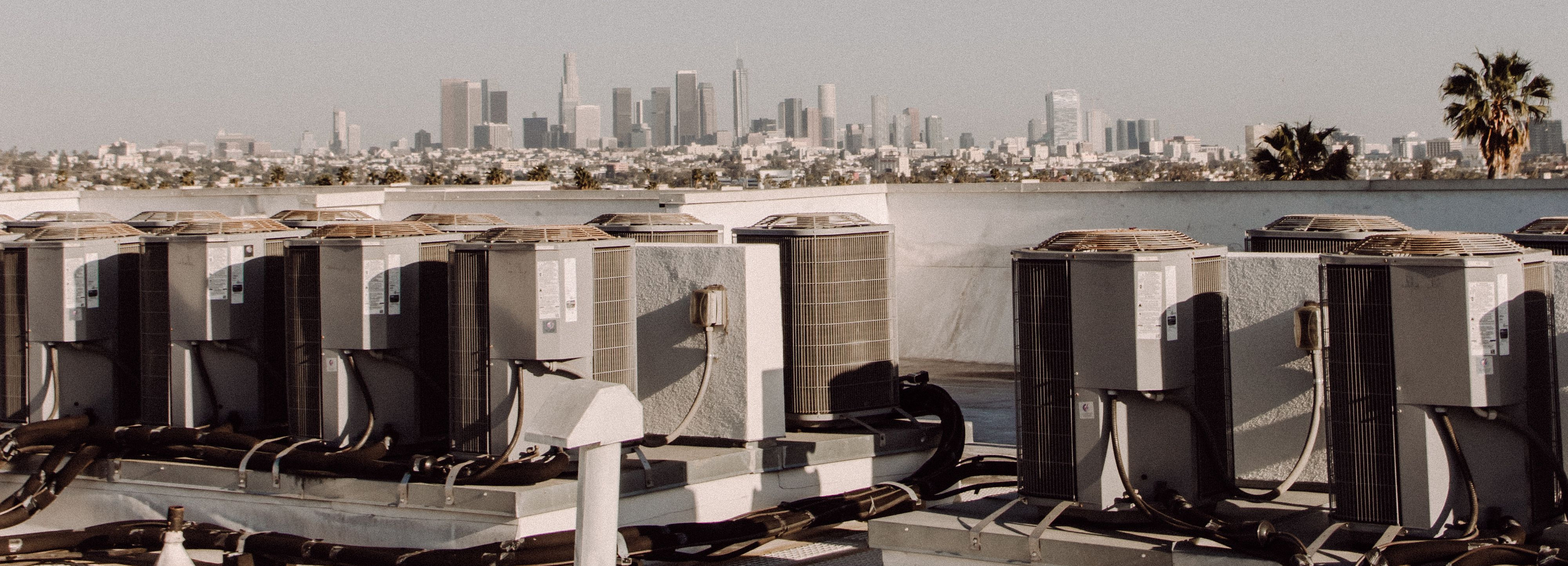 Commercial rooftop HVAC units and mechanical pipework